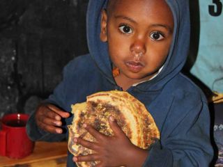 young-boy-receiving-nutritious-food.jpg