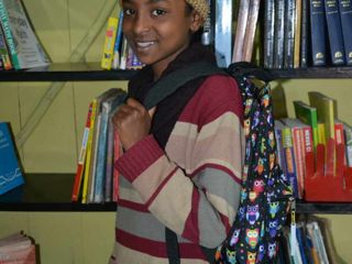 Korah-student-with-new-backpack.jpg