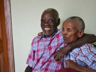 two-friends-smiling-together-after-elders-home-opened.jpg