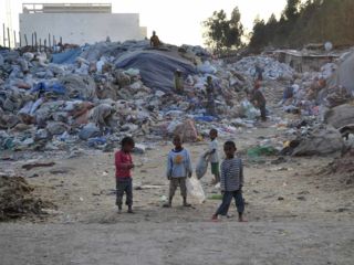 kids-and-adults-at-garbage-dump.jpg