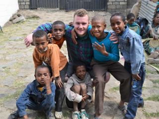 jake-with-group-of-children.jpg