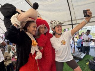kristen with the mascots.jpg