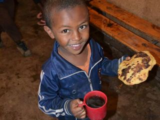 happy-boy-with-drink-and-berta-pancake.jpg