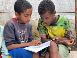 Ethiopian boys reading