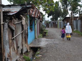 mother-and-daughter-walking-in-street.jpg