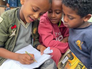 Ethiopian boys reading