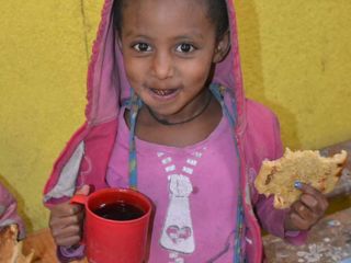 happy-girl-eating-berta-pancake.jpg