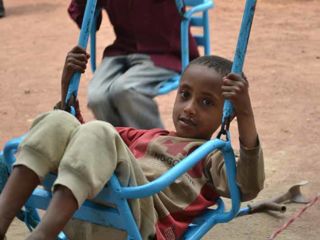 playing-on-the-swings.jpg