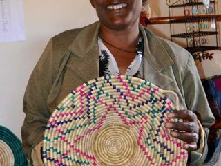 woman-holding-up-beautiful-basket.jpg