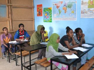 inside-classroom-students-receiving-education.jpg