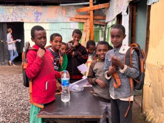 Ethiopian children with new backpacks