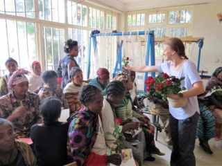 jacqueline-handing-out-roses.jpg