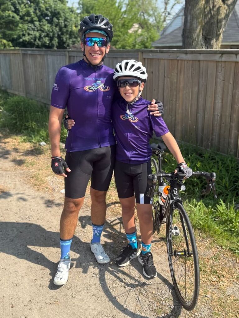 father son cyclists